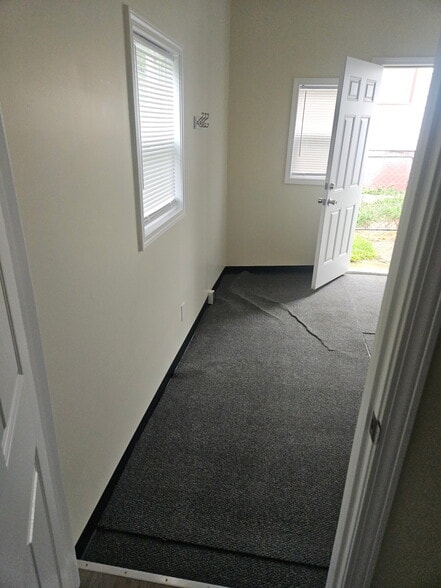 Back door entry into mud room. This entry leads to off street parking in your backyard, via alleywa - 728 S 15th St