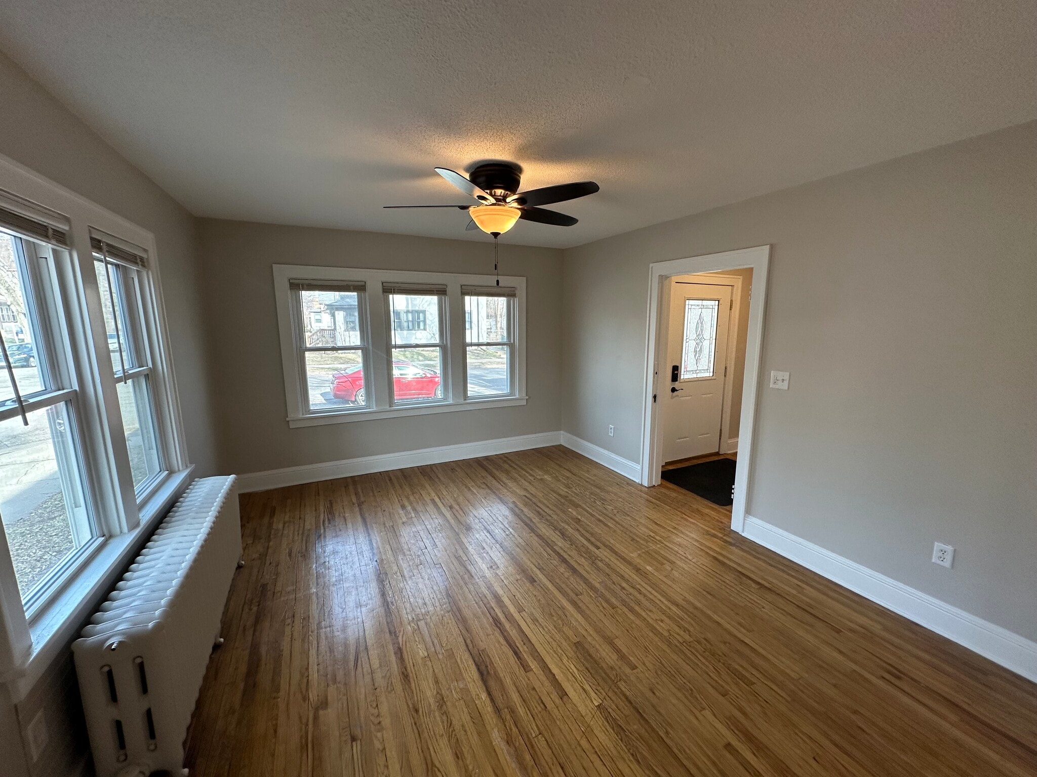 Living room and front entry - 235 Logan Ave N