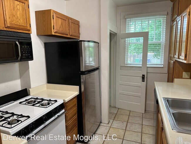 Building Photo - 3 br, 2 bath House - 1034 S. Corona St.