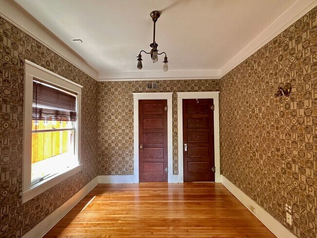 Building Photo - Meticulously Restored 1920s Craftsman on a Private, Hedged Lot | Pet Friendly!