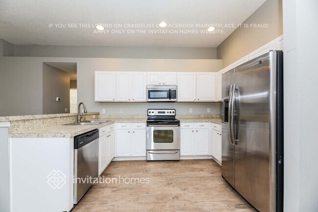 Building Photo - 4591 Misty Dawn Ct N