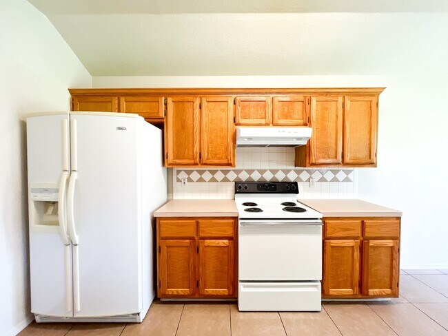 Building Photo - Available NOW!!!! Open floor plan features living room with fireplace, dining area, and large kit...