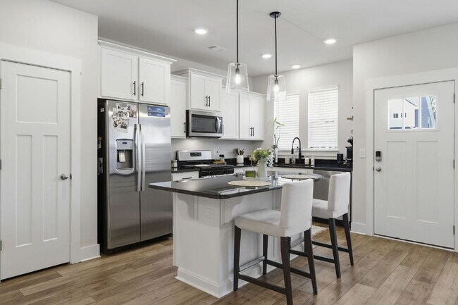 Building Photo - Luxury 3BR/2.5BA Craftsman Townhome with Designer Finishes & Open-Concept Living in Trailside at ...