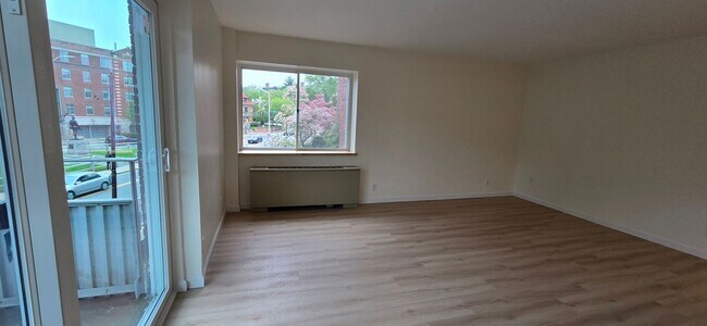 Building Photo - Everything is new! Harvard Sq! Walk to T! Large 1bd with balcony! Parking included!