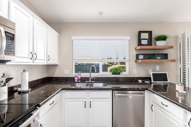 Building Photo - The Search is Over! 3-Bedroom, 2.5 baths with Refreshing Fenced Play Pool!