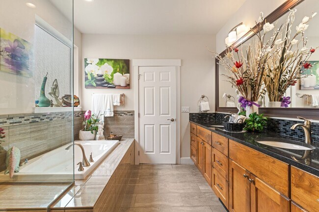 Building Photo - 3-bedroom, 2-bathroom home featuring an op...