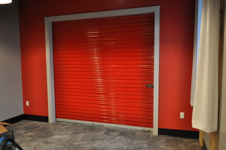 Industrial styling throughout - including hidden full-size Murphy Bed for guests - 208 W Broadway St