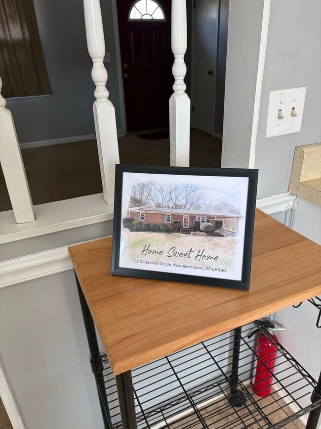 Building Photo - FENCED IN YARD AND LARGE DETACHED TWO CAR GARAGE LOCATED IN THE DESIRED TRAVELERS REST!!!