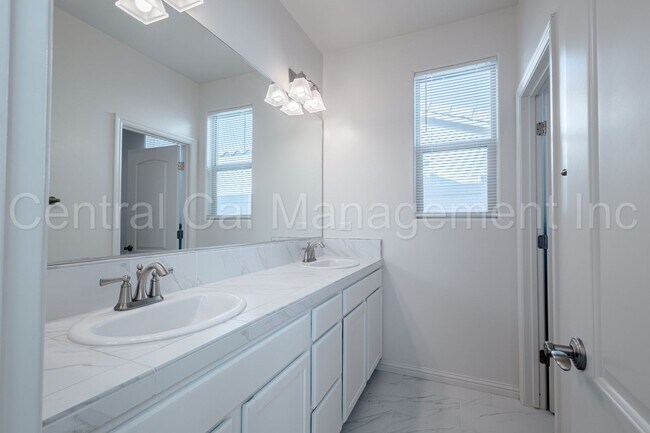 Building Photo - 4 Bedroom/3 Bath Home with Office and Paid Solar - $3295 Per Month!