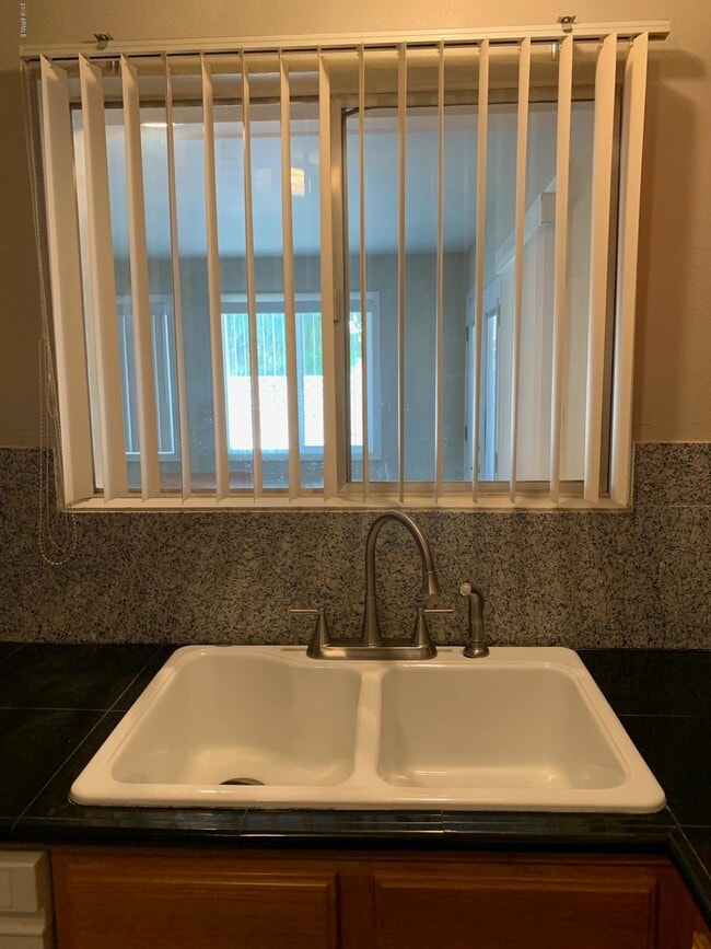 Building Photo - 10654 W Alabama Ave