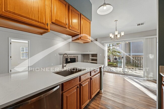 Building Photo - Updated Condo with Central AC and Gas Fireplace