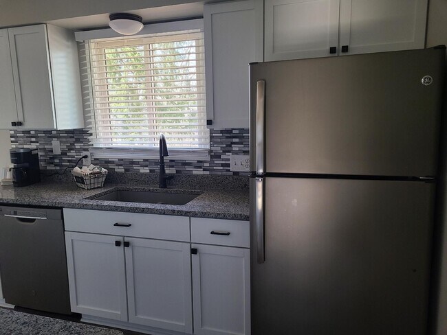 Remideled with granite counter tops - 5596 Amblewood Dr NE