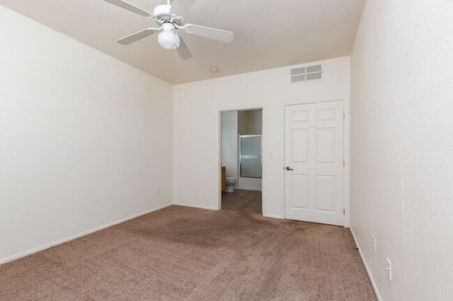 Building Photo - Three bedroom unit in gated community with...