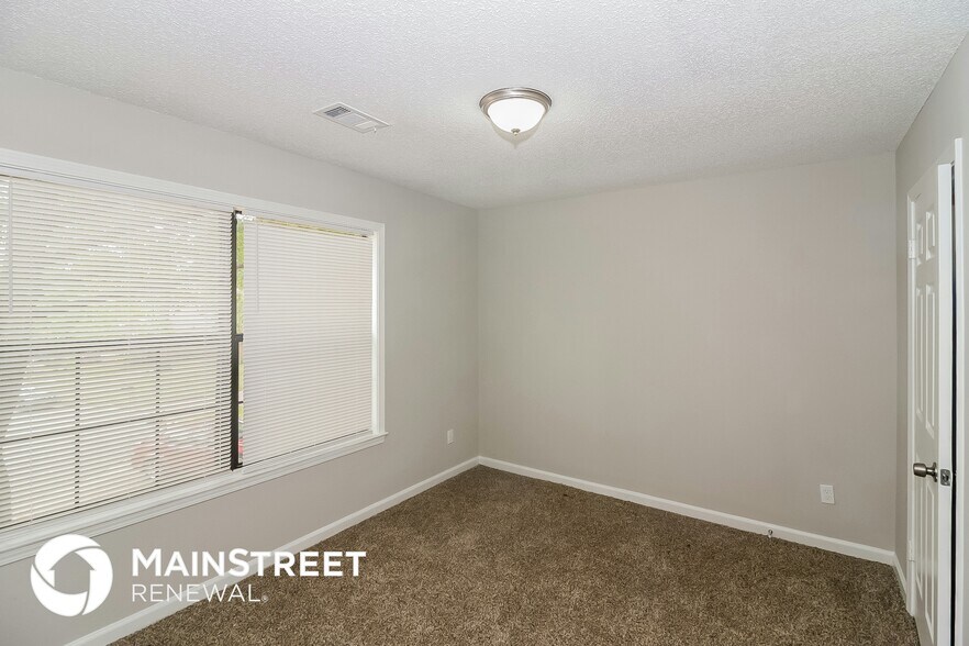 Building Photo - 4509 N Quail Flight Cove