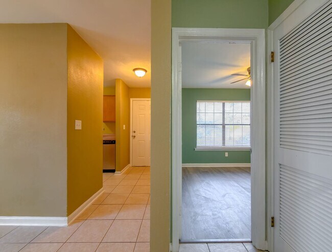 Building Photo - LOVELY & Modern NW 2/1 w/ New Flooring & Huge Privacy Fenced Yard that Inc Lawn Maintenance! Avai...