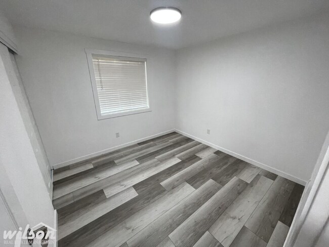 Building Photo - 3 Bed, 2 Bath Home with a Two-Car Garage, Fenced Backyard, and Lawn Care Included