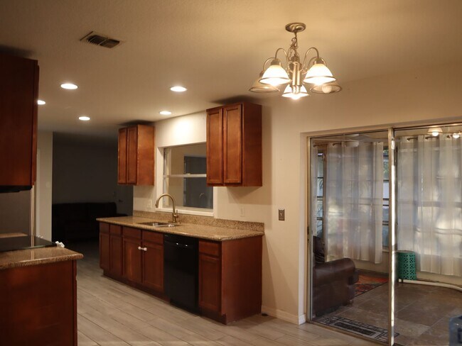 Building Photo - Great Location 3 bedroom 2 Bath 2 Car Garage Call/Text Carole Arcaro 386-216-4900 Deltona Lakes R...