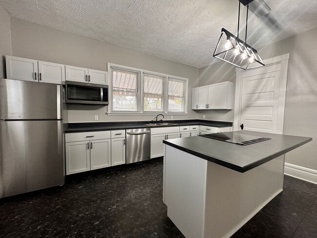 Building Photo - Updated 3-Bedroom Gem with Classic Charm a...