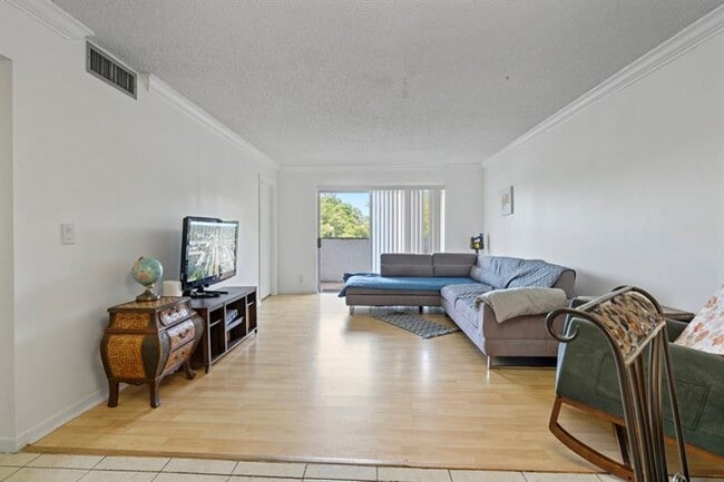 Building Photo - 6075 N Sabal Palm Blvd