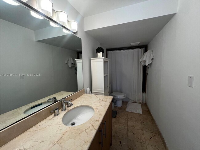 Building Photo - 10275 Collins Ave