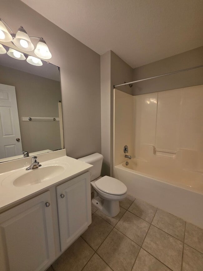 Building Photo - Spacious 4-Bedroom Bryan Farms Beauty with Bonus Suite, Large Fenced Yard & RV/Boat Parking!