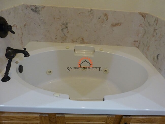 Building Photo - Stunning 4 bedroom 3 bath brick home with 5 car garage!