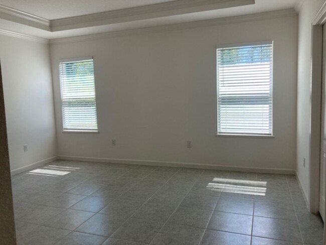 Building Photo - Like New 3 bedroom + den with French doors, screened in porch and Fenced yard and much more...