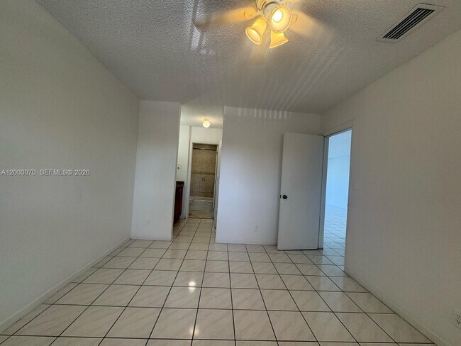 Building Photo - 7410 Woodmont Terrace