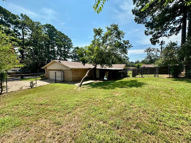 Building Photo - Spacious 4-Bedroom Home on a Corner Lot wi...