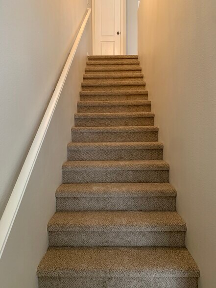 Stairs to upstairs bedrooms - 17168 Newhope St