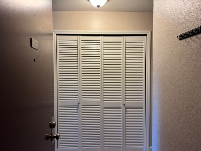 Building Photo - Serene Ground-Floor Condo Overlooking Green Space – Parking Included