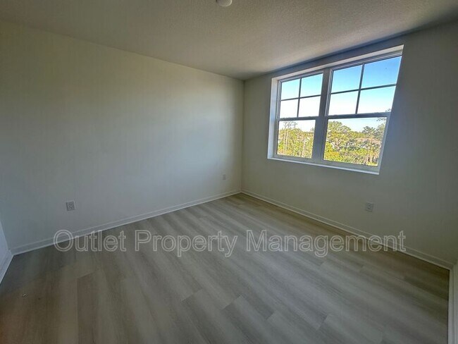 Building Photo - 5587 Millennia Park Dr