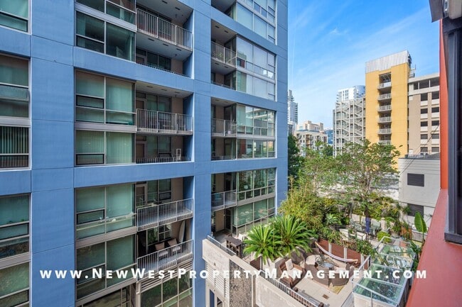 Building Photo - Modern Icon one bedroom in the heart of East Village! Small Pet OK! Available Now! 1 Pkng Space I...