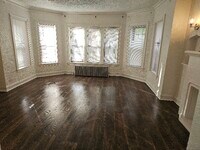 Building Photo - 8119 S Vernon Ave