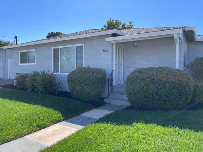 Building Photo - Huge yard with 4 car garage! Newly Remodel...