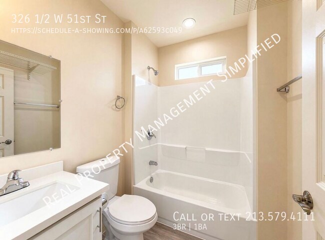 Building Photo - 326 1/2 W 51st St-
