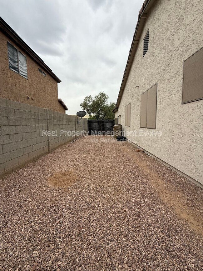 Building Photo - 8278 W Charter Oak Rd