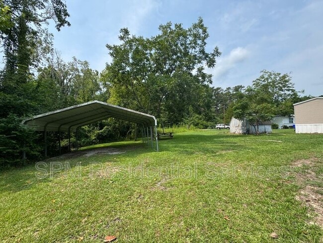 Building Photo - 1227 Village Rd NE