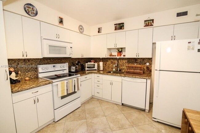 Building Photo - 5151 Collins Ave