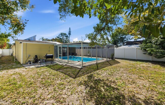 Building Photo - Charming Sarasota Retreat –4-Bedroom/3-Bathroom Modern Pool Home Near Everything!