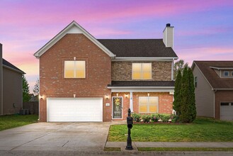 Building Photo - Pet Friendly Three Bedroom with Bonus!