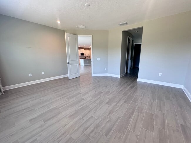 Building Photo - New Construction in Grand Park-4 Bedrooms and 4 Bathrooms with a Den and a Loft! No deposit for q...