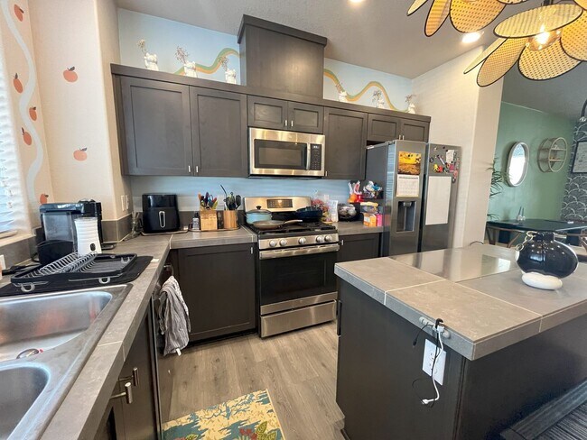 Building Photo - Your Modern Retreat with Open Living Space...