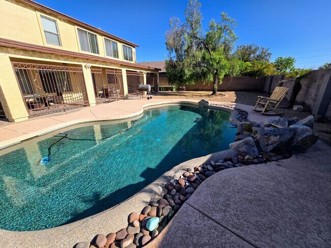Building Photo - STUNNING 4 Bed, 2.5 Bath Oasis with Pool Your Dream Home Awaits!