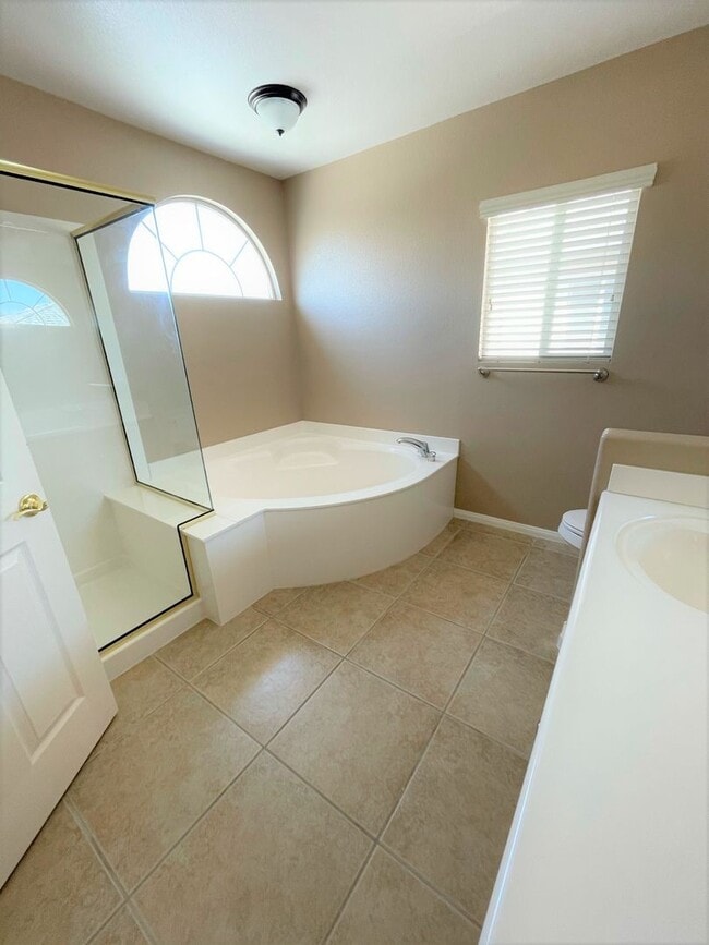 Building Photo - Two-story 4 BR & 3 BA designs offer luxuri...