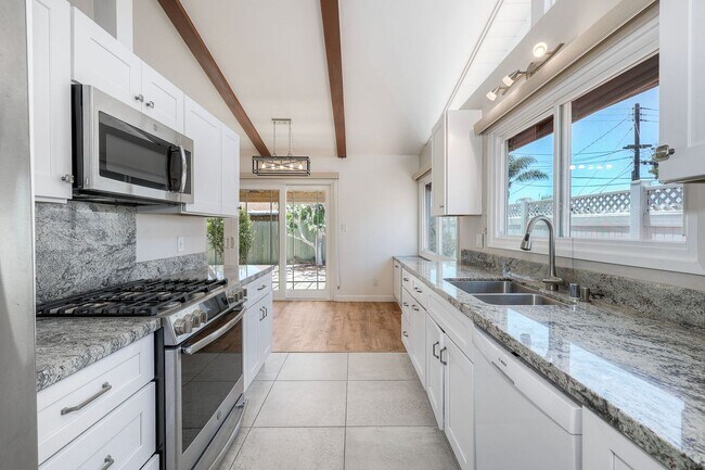 Building Photo - San Diego- Near Del Cerro - Refreshed 4 bed / 2 bath Home w/Solar ,A/C, Large Yard, Garage, and M...