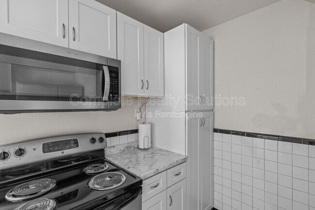 Building Photo - 1150 N Florissant Rd