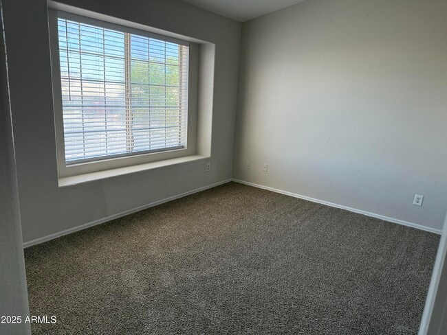 Building Photo - 8460 W Aster Dr
