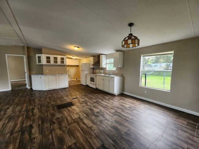 Building Photo - 3 bed, 2 bath w/ Front & Back Decks, 1/4 Acre of land, FENCED backyard