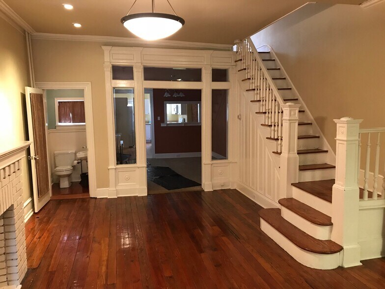 Living room with bath and den view - 1518 S 13th St